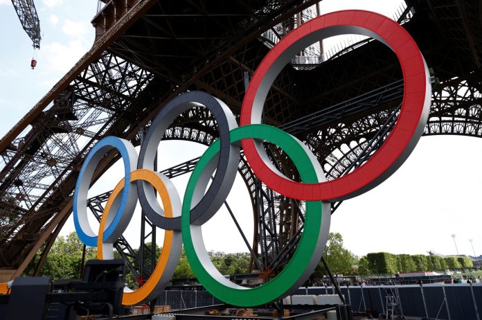 France lights up Eiffel Tower with Olympic rings ahead of Games