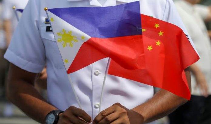 Philippines, China reach agreement on disputed sea missions