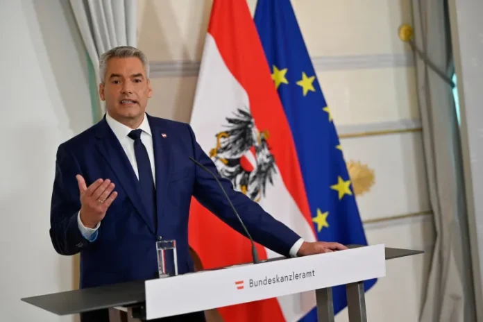 Austria's conservatives tasked with forming government despite losing election