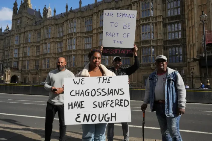 Chagos islanders displaced for US military base marched to UK parliament