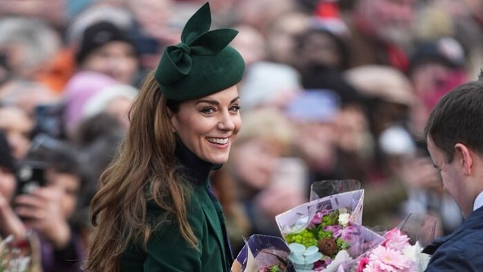 Kate hugs cancer survivor after Christmas Service