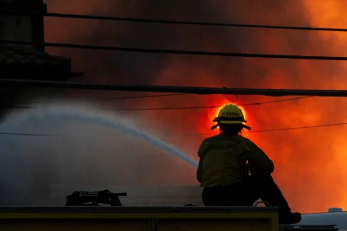 Los Angeles wildfire deaths rise to 24, strong winds forecast to return