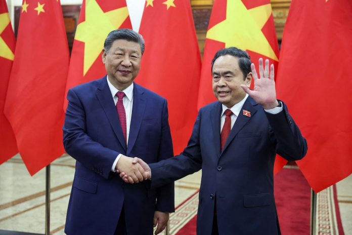 Trump says Xi in Vietnam to 