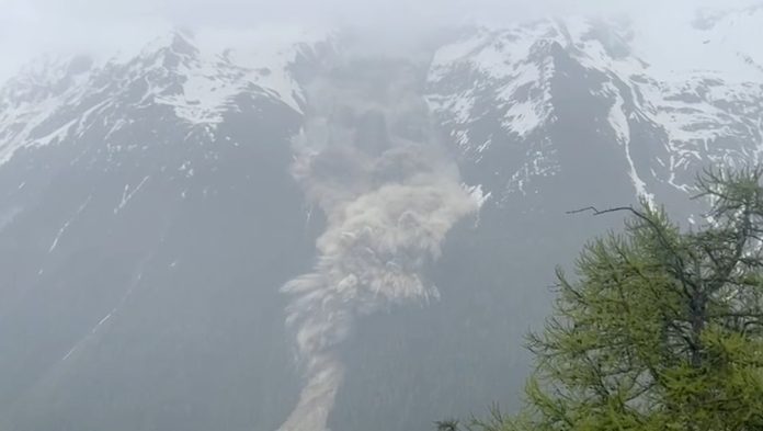 Mud and rock buries evacuated Swiss village after glacier collapse