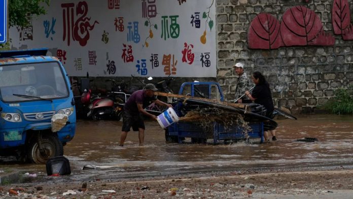 At least 30 killed and several missing as heavy rains lash China